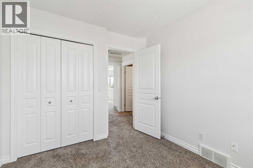 86 Crystal Shores Cove, Okotoks, Alberta  T1S 2B4 - Photo 29 - A2312641