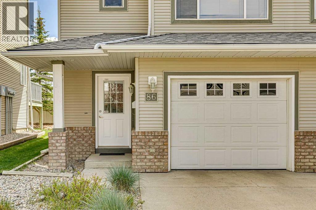 86 Crystal Shores Cove, Okotoks, Alberta  T1S 2B4 - Photo 3 - A2312641