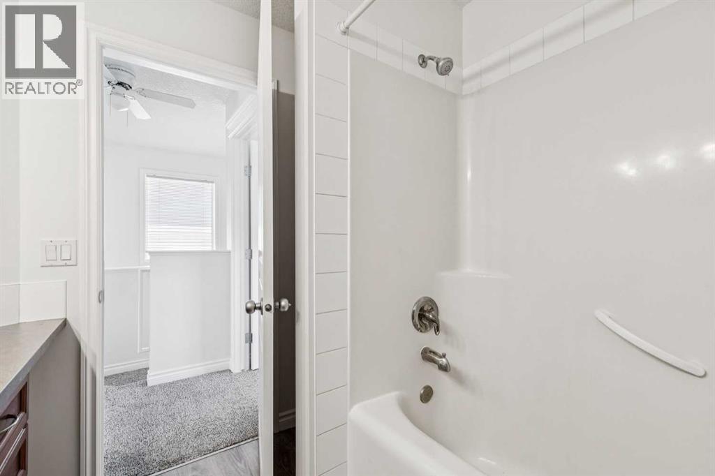 86 Crystal Shores Cove, Okotoks, Alberta  T1S 2B4 - Photo 32 - A2312641