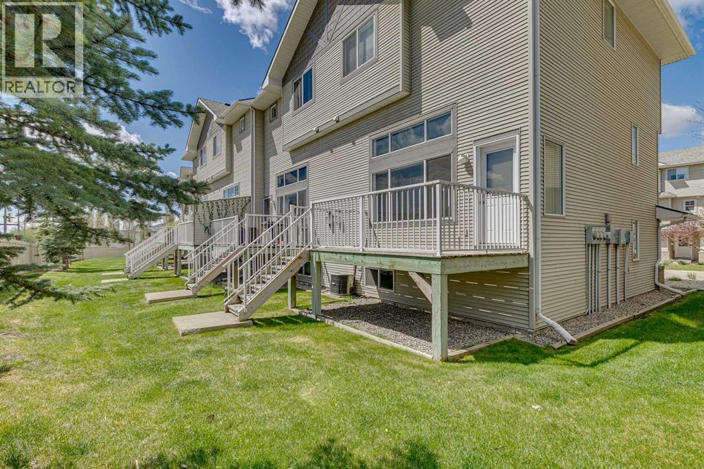 86 Crystal Shores Cove, Okotoks, Alberta  T1S 2B4 - Photo 4 - A2312641