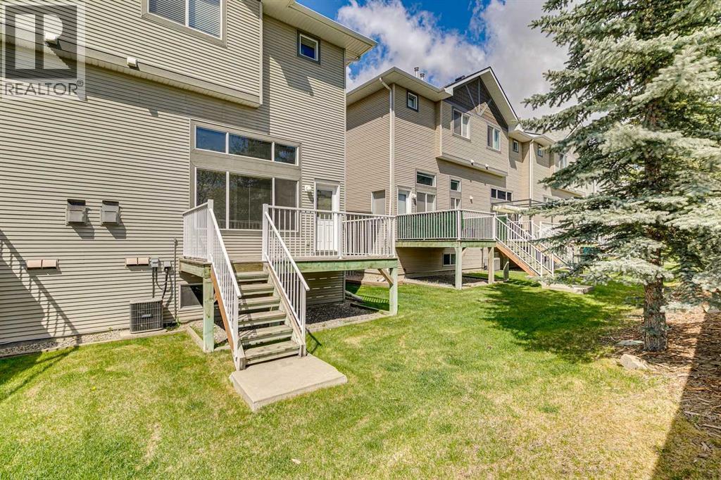 86 Crystal Shores Cove, Okotoks, Alberta  T1S 2B4 - Photo 8 - A2312641