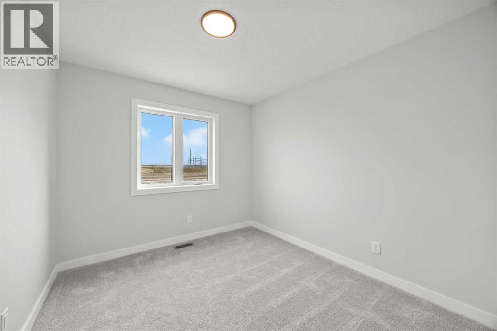 21 Hotchkiss Gardens SE, Calgary, Alberta  T3S 0T7 - Photo 24 - A2310785