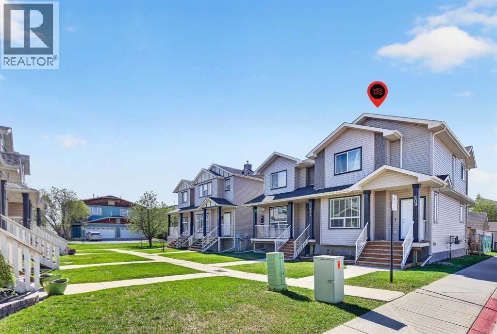 209 Sandford Place NW, Langdon, Alberta  T0J 1X2 - Photo 3 - A2311103