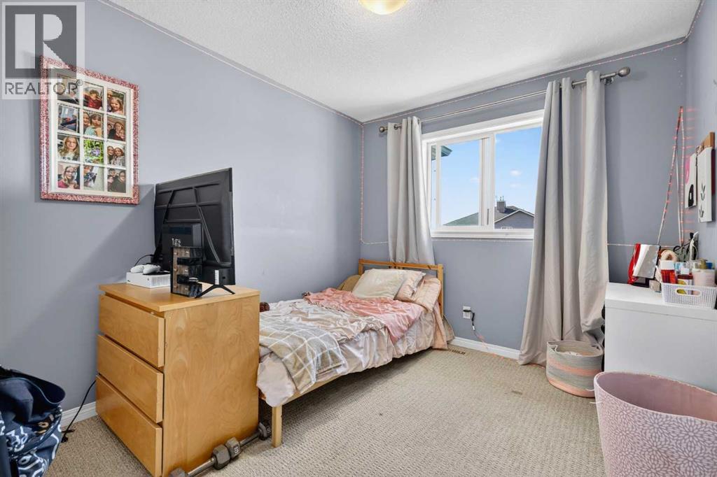 209 Sandford Place NW, Langdon, Alberta  T0J 1X2 - Photo 32 - A2311103