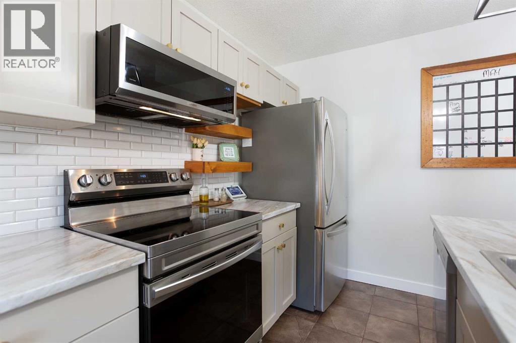130 Luxstone Way Sw, Airdrie, Alberta  T4B 0H6 - Photo 9 - A2311405