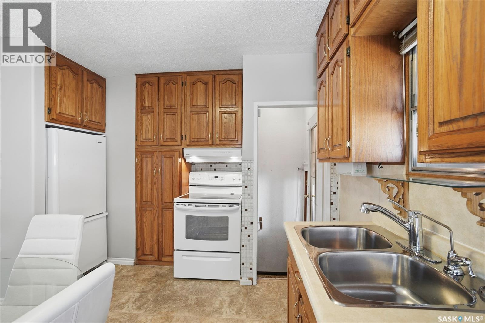 721 H Avenue S, Saskatoon, Saskatchewan  S7M 1X2 - Photo 11 - SK036541