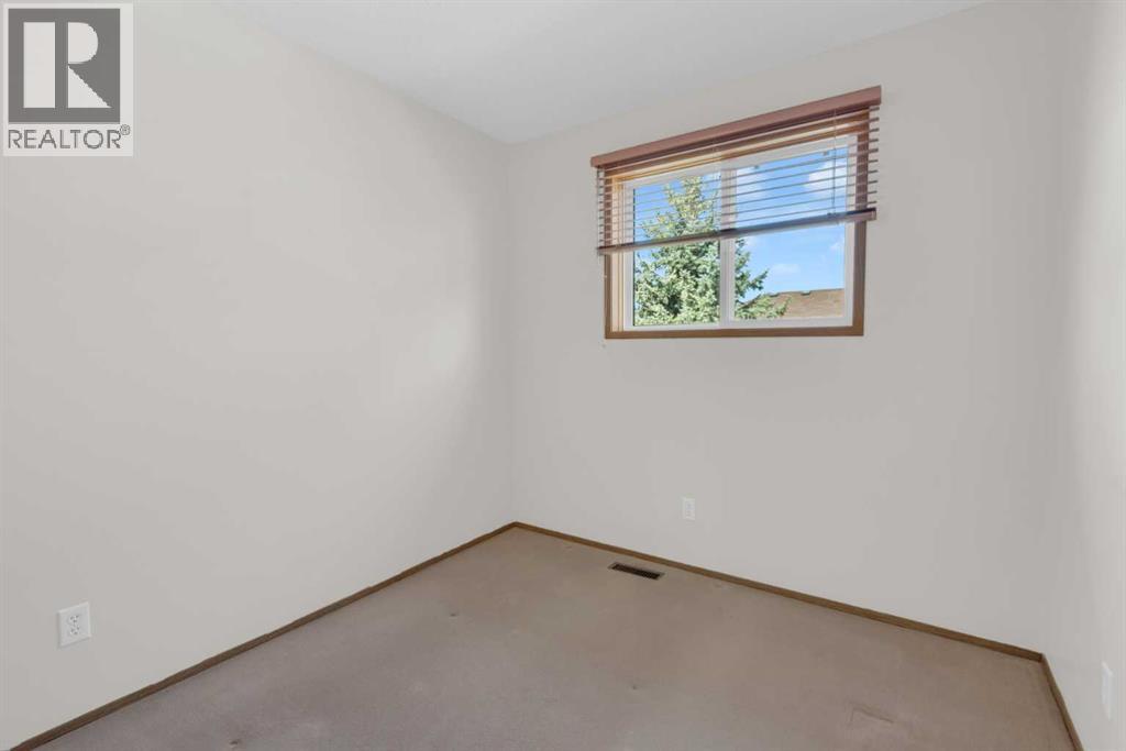 216 Shawinigan Drive SW, Calgary, Alberta  T2Y 3B4 - Photo 25 - A2309802