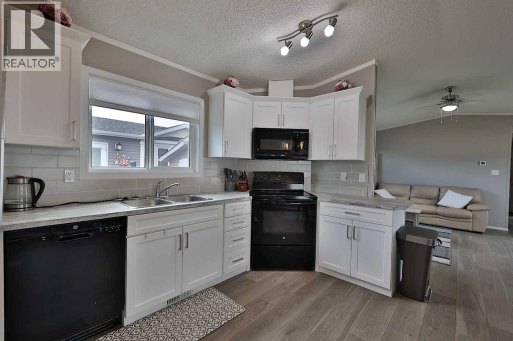 5021 Applewood Road, Coaldale, Alberta  T1M 0C6 - Photo 11 - A2312687
