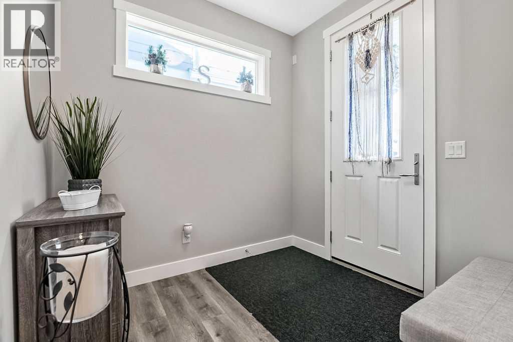 75 Sundown Way, Cochrane, Alberta  T4C 2M4 - Photo 3 - A2306790