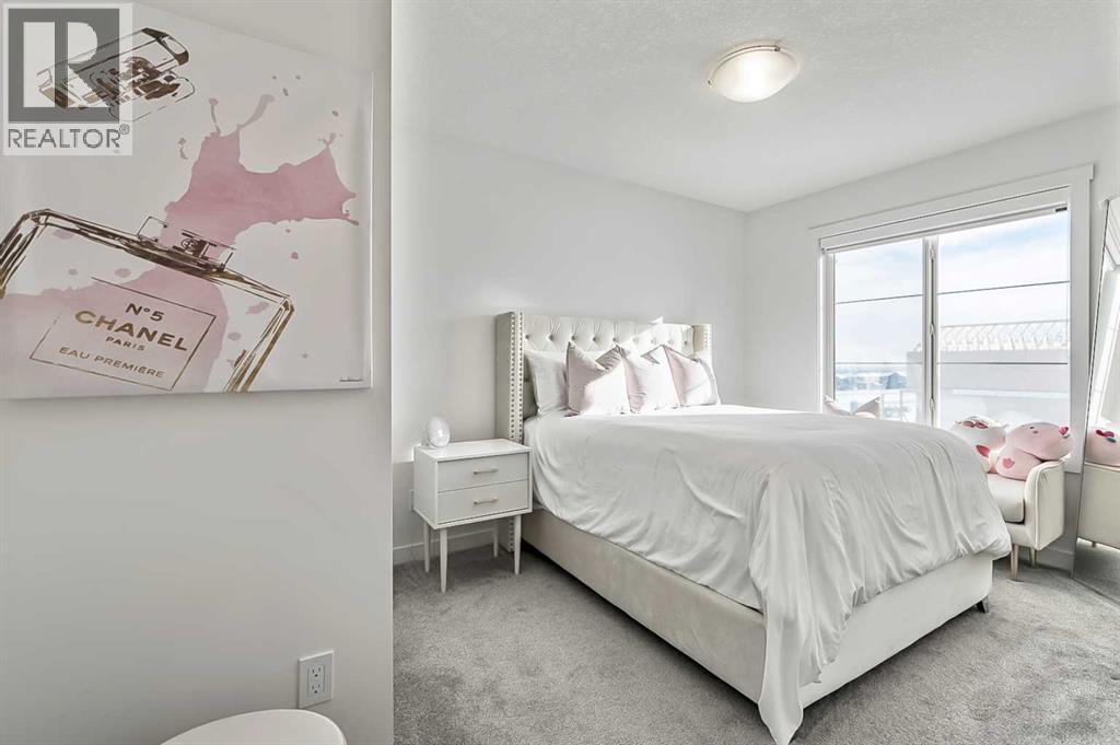882 Bluerock Way SW, Calgary, Alberta  T2Y 0S5 - Photo 27 - A2293006