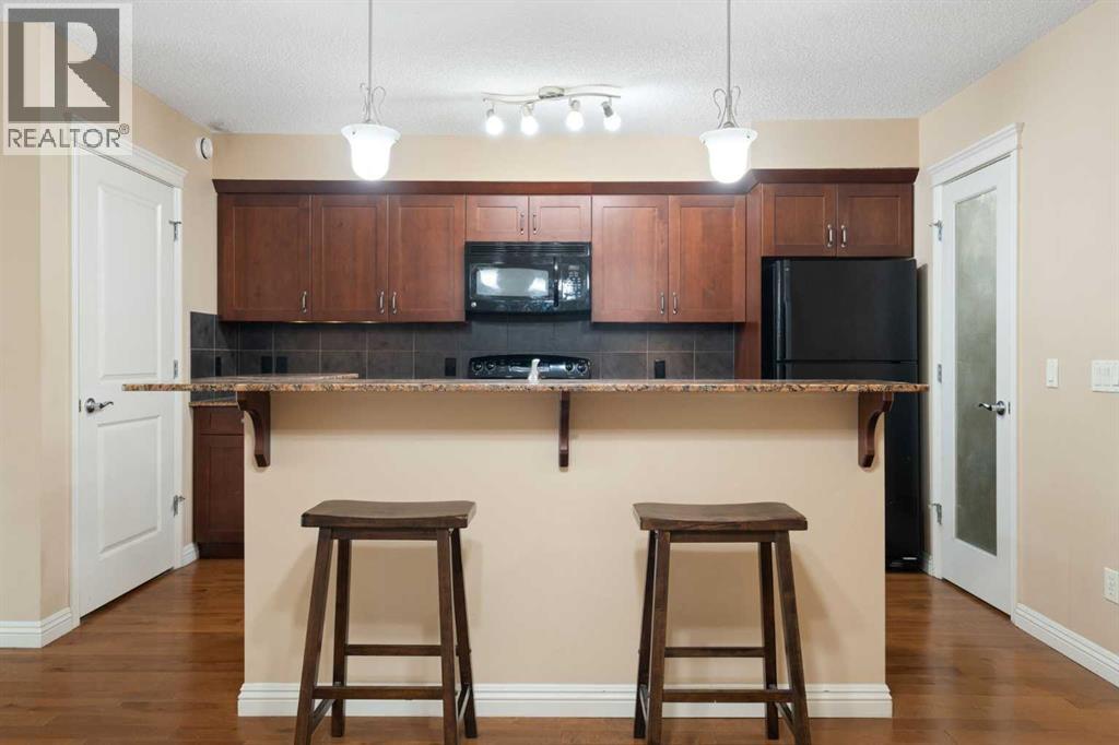 30 Mike Ralph Way SW, Calgary, Alberta  T3E 0H8 - Photo 5 - A2307454