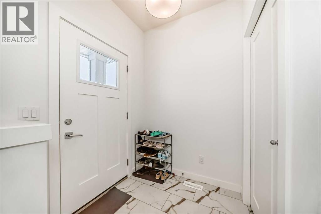 106 Dawson Harbour Grove, Chestermere, Alberta  T1X 2S4 - Photo 6 - A2310343