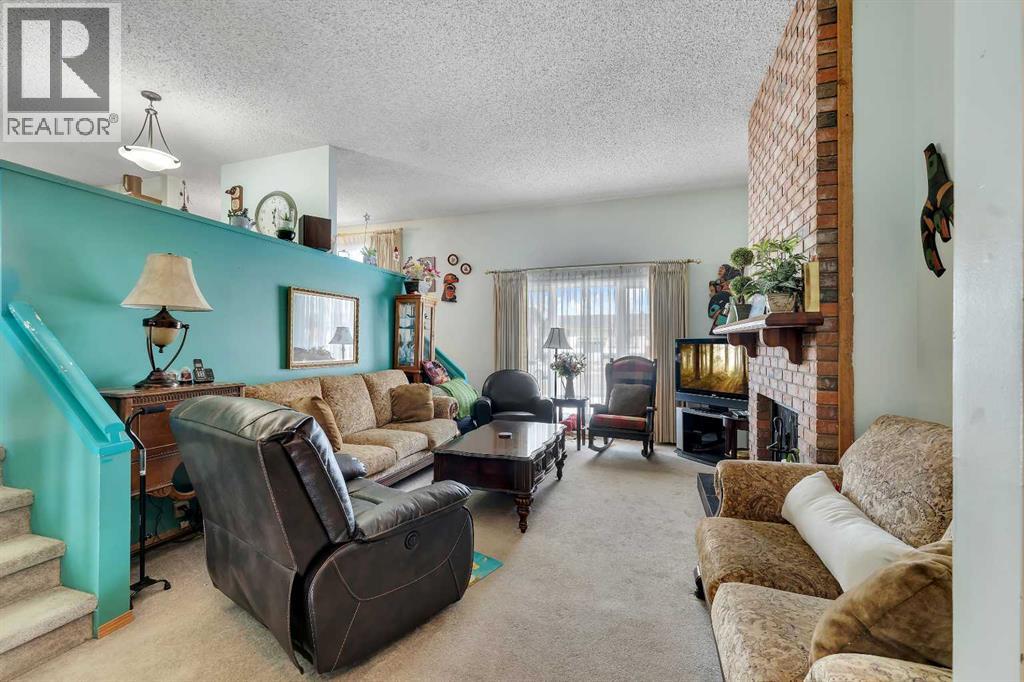 1003 Berkley Drive NW, Calgary, Alberta  T3K 1E3 - Photo 6 - A2301092