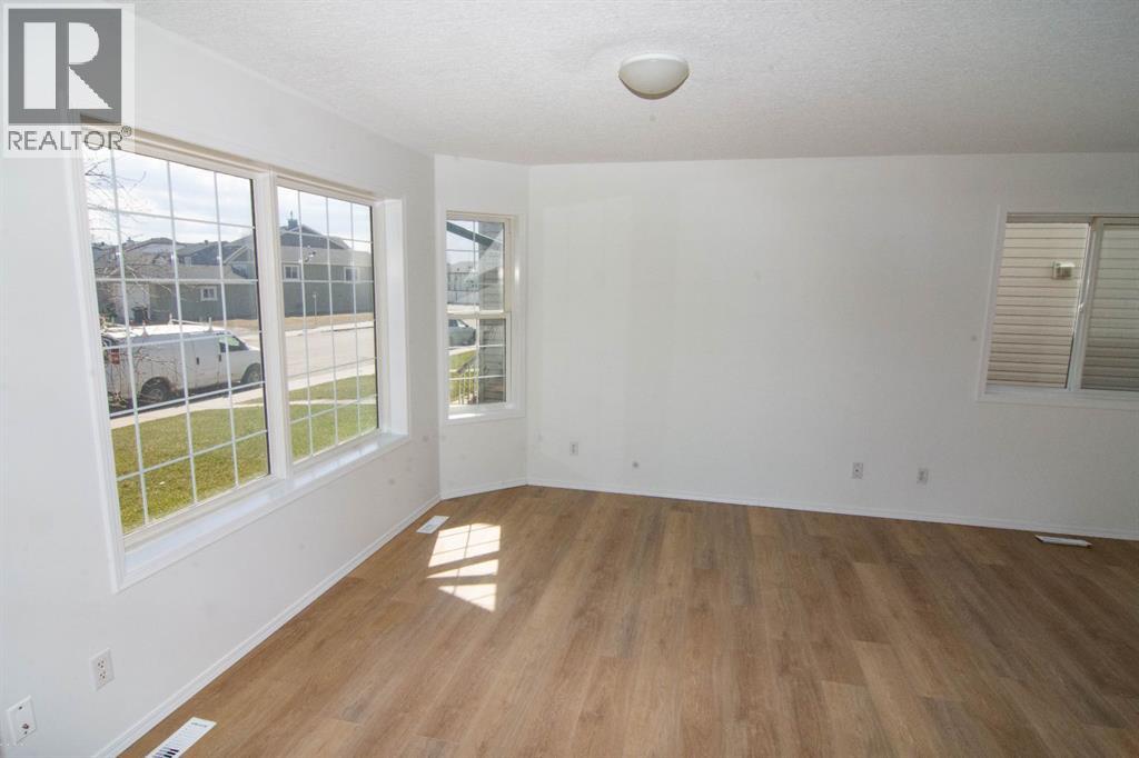 5320 Martin Crossing Drive NE, Calgary, Alberta  T3J 3T2 - Photo 4 - A2306775