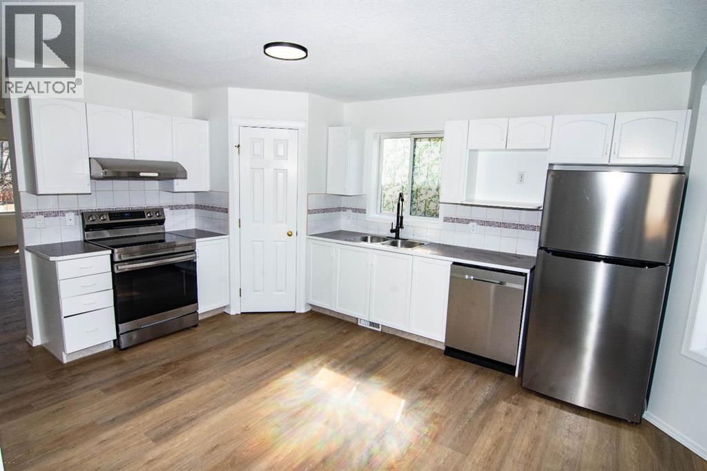 5320 Martin Crossing Drive NE, Calgary, Alberta  T3J 3T2 - Photo 7 - A2306775