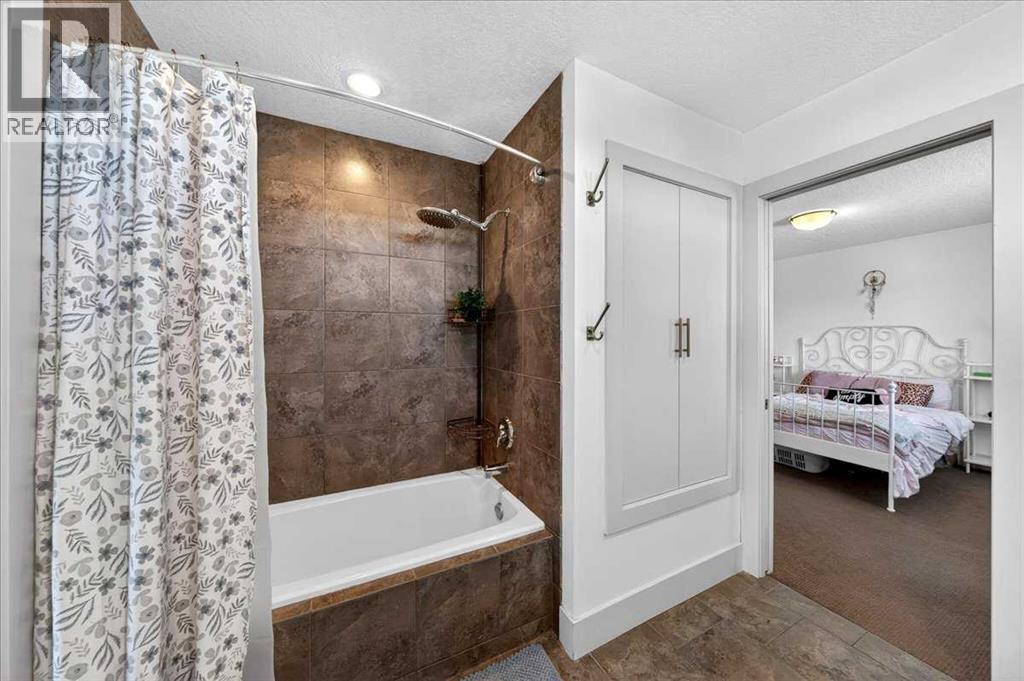 917 Channelside Road SW, Airdrie, Alberta  T4B 3J3 - Photo 24 - A2307575