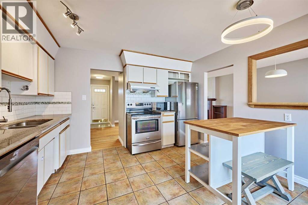 612 101 Avenue Sw, Calgary, Alberta  T2W 0A1 - Photo 12 - A2308420