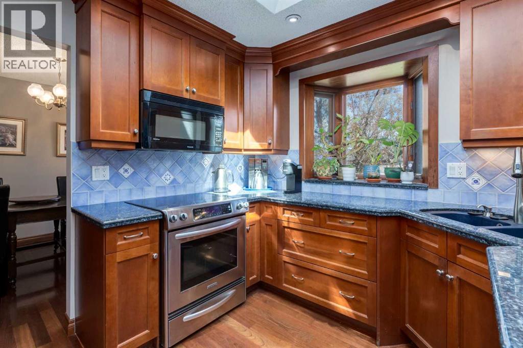 2724 Palliser Drive SW, Calgary, Alberta  T2V 4G2 - Photo 9 - A2312870