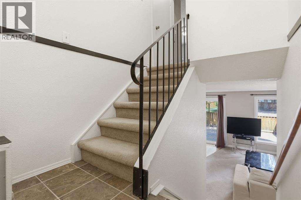 100, 4740 Dalton Drive NW, Calgary, Alberta  T3A 2H4 - Photo 4 - A2308041