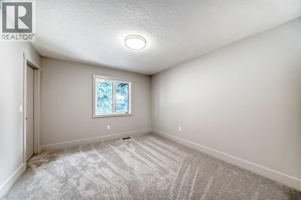1115 Lake Wapta Road SE, Calgary, Alberta  T2J 2P3 - Photo 18 - A2312157