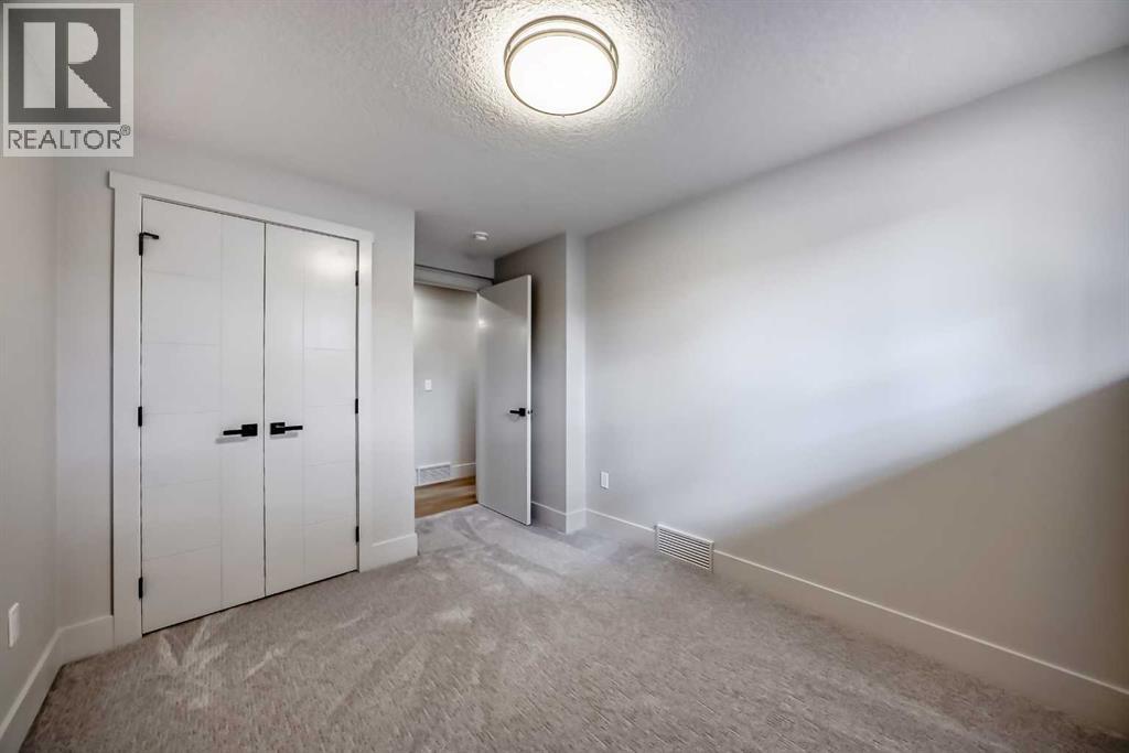 1115 Lake Wapta Road SE, Calgary, Alberta  T2J 2P3 - Photo 27 - A2312157