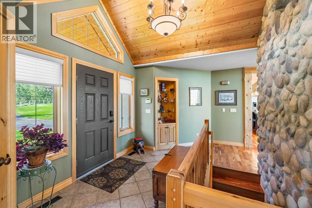 98 Equestrian Drive, Rural Rocky View County, Alberta  T3R 1C9 - Photo 6 - A2311281