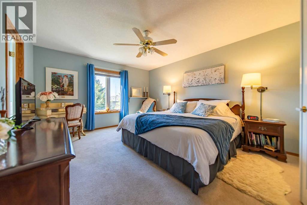 76 Sunset Crescent, Okotoks, Alberta  T1S 1P5 - Photo 23 - A2312229