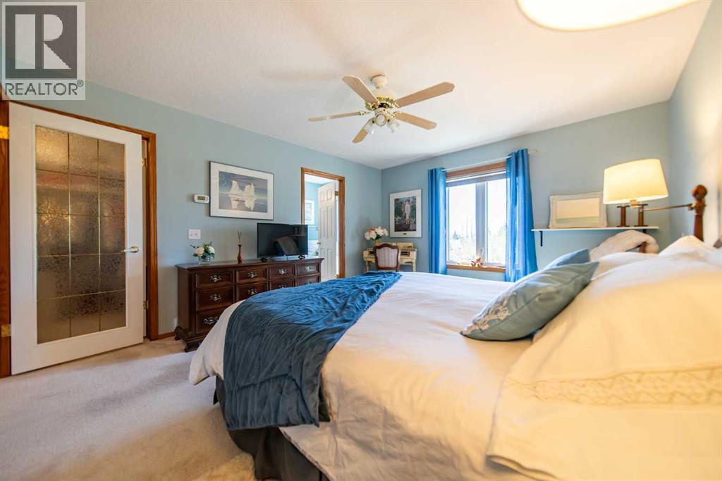 76 Sunset Crescent, Okotoks, Alberta  T1S 1P5 - Photo 24 - A2312229