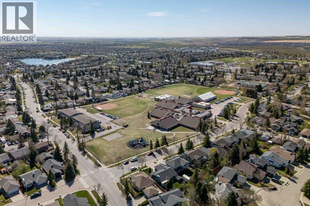 76 Sunset Crescent, Okotoks, Alberta  T1S 1P5 - Photo 47 - A2312229
