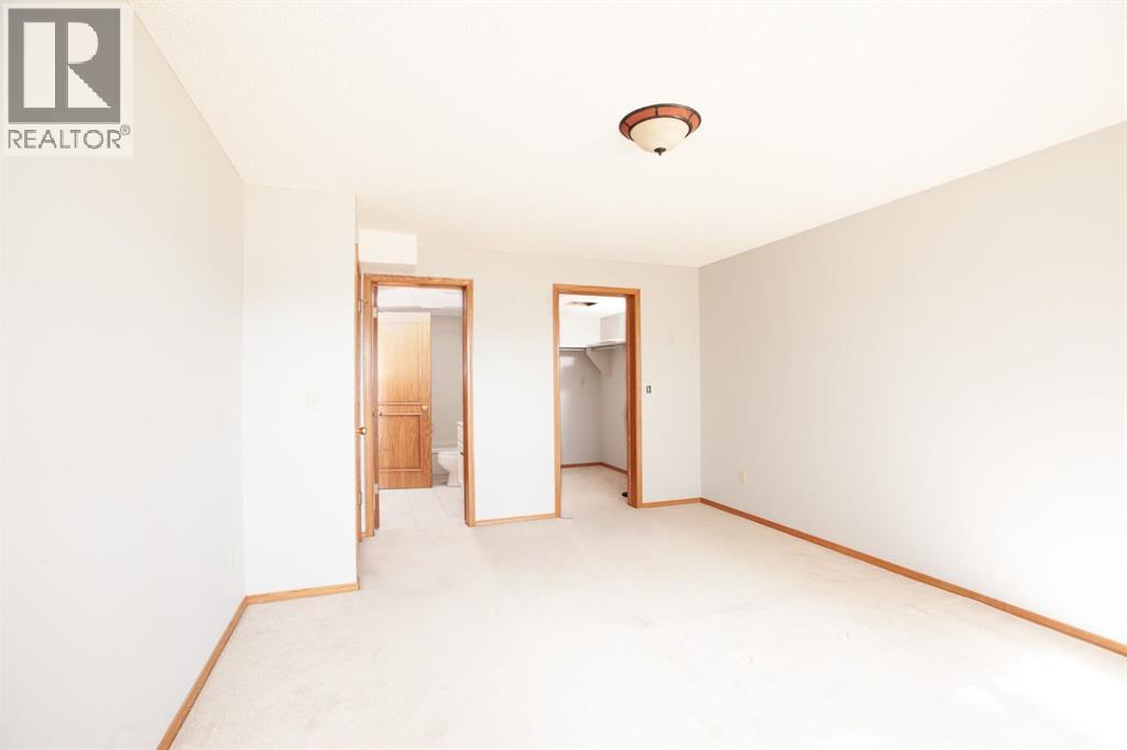24 Sunrise Way, Priddis Greens, Alberta  T0L 1W3 - Photo 18 - A2303634
