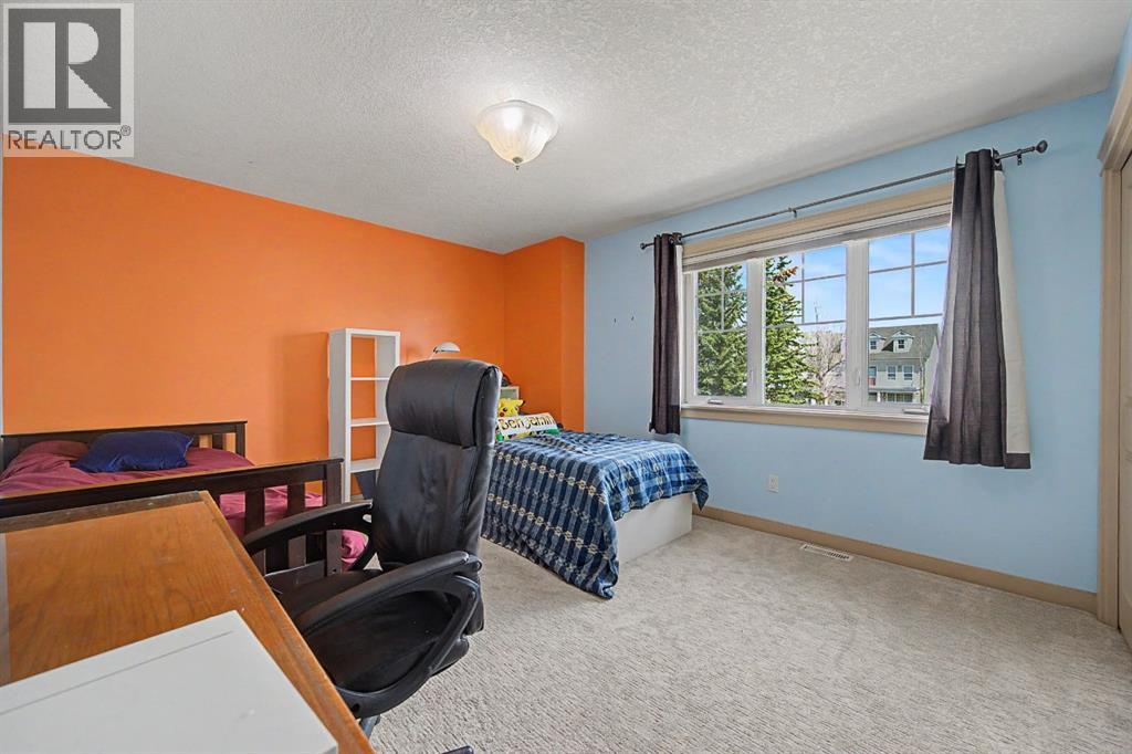 8 Ypres Lane SW, Calgary, Alberta  T2T 6M9 - Photo 23 - A2306239