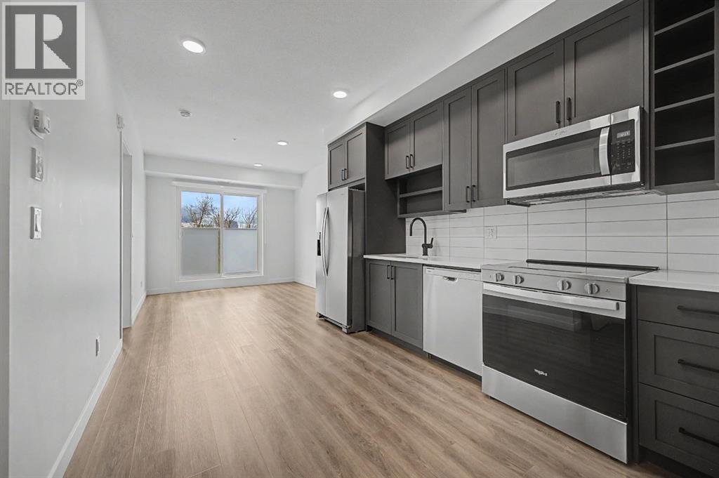 205, 3107 Warren Street, Calgary, Alberta  T3B 0M2 - Photo 5 - A2313044