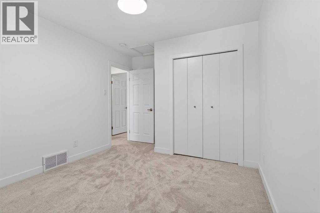 416 Thornhill Place NW, Calgary, Alberta  T2K 2S5 - Photo 32 - A2311932