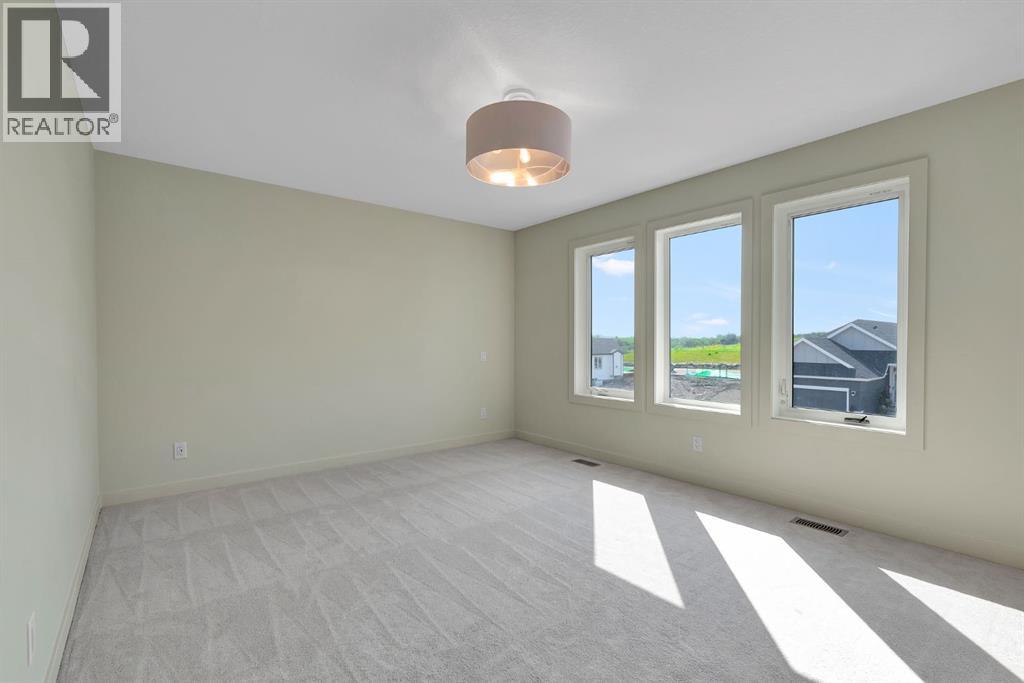 96 Fireside Common, Cochrane, Alberta  T4C 3J1 - Photo 21 - A2309740