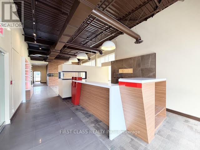 201 - 20 Gibson Drive, Markham, Ontario  L3R 0M7 - Photo 2 - N13082158