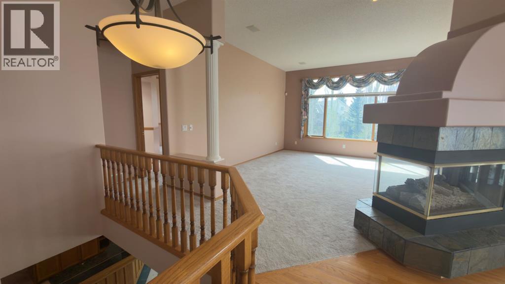 117 Woodpark Close SW, Calgary, Alberta  T2W 6H1 - Photo 28 - A2309782
