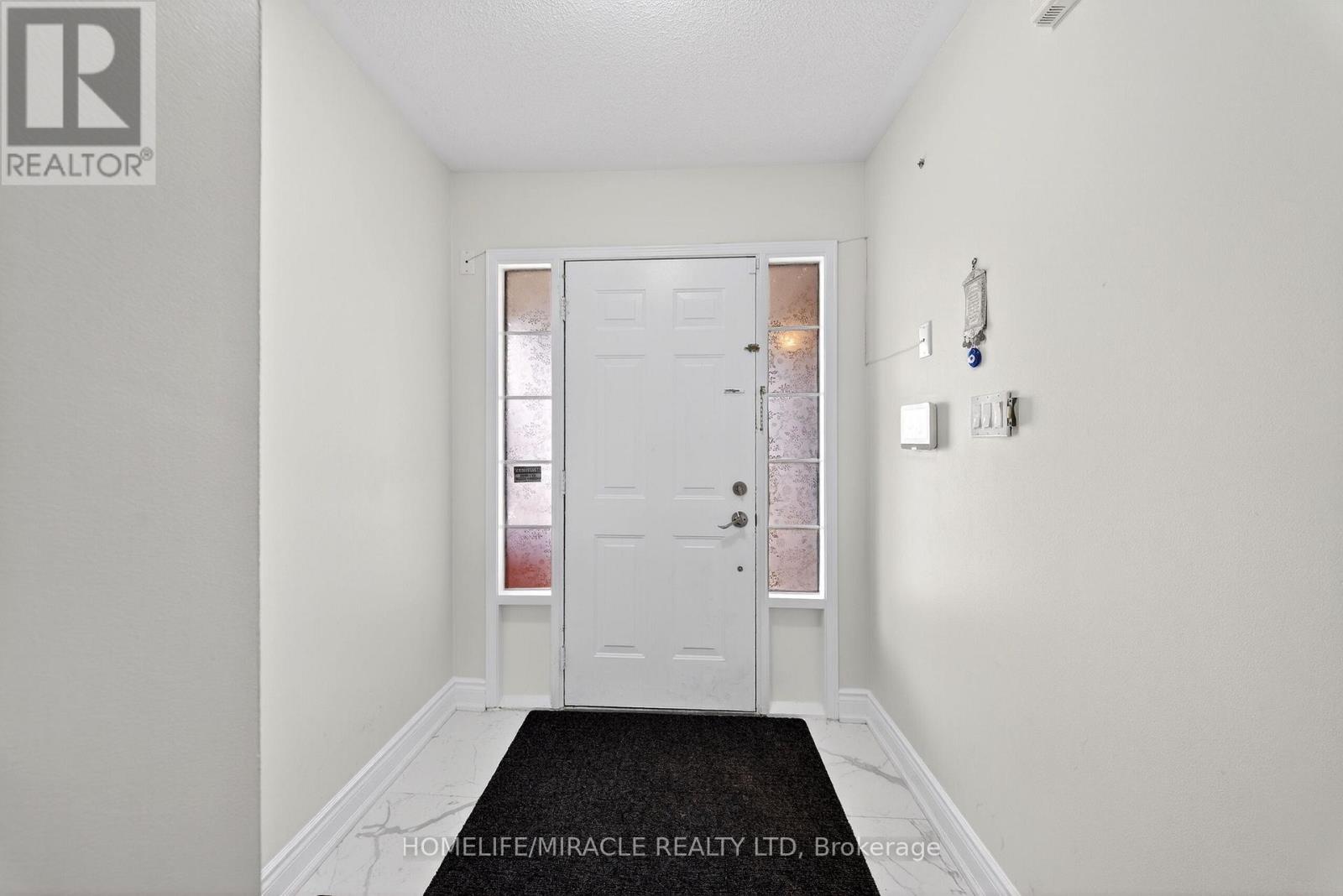 71 Roadmaster Lane, Brampton, Ontario  L7A 3A7 - Photo 4 - W12865382