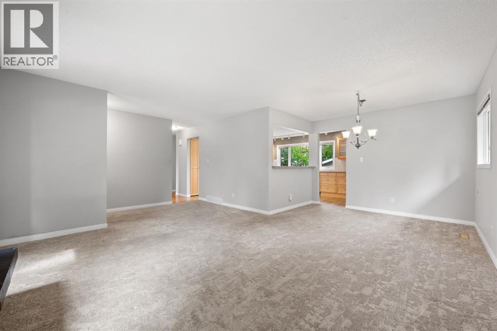 52 Lake Lucerne Close SE, Calgary, Alberta  T2J 3H8 - Photo 9 - A2313035
