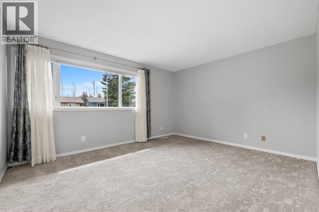 52 Lake Lucerne Close SE, Calgary, Alberta  T2J 3H8 - Photo 18 - A2313035