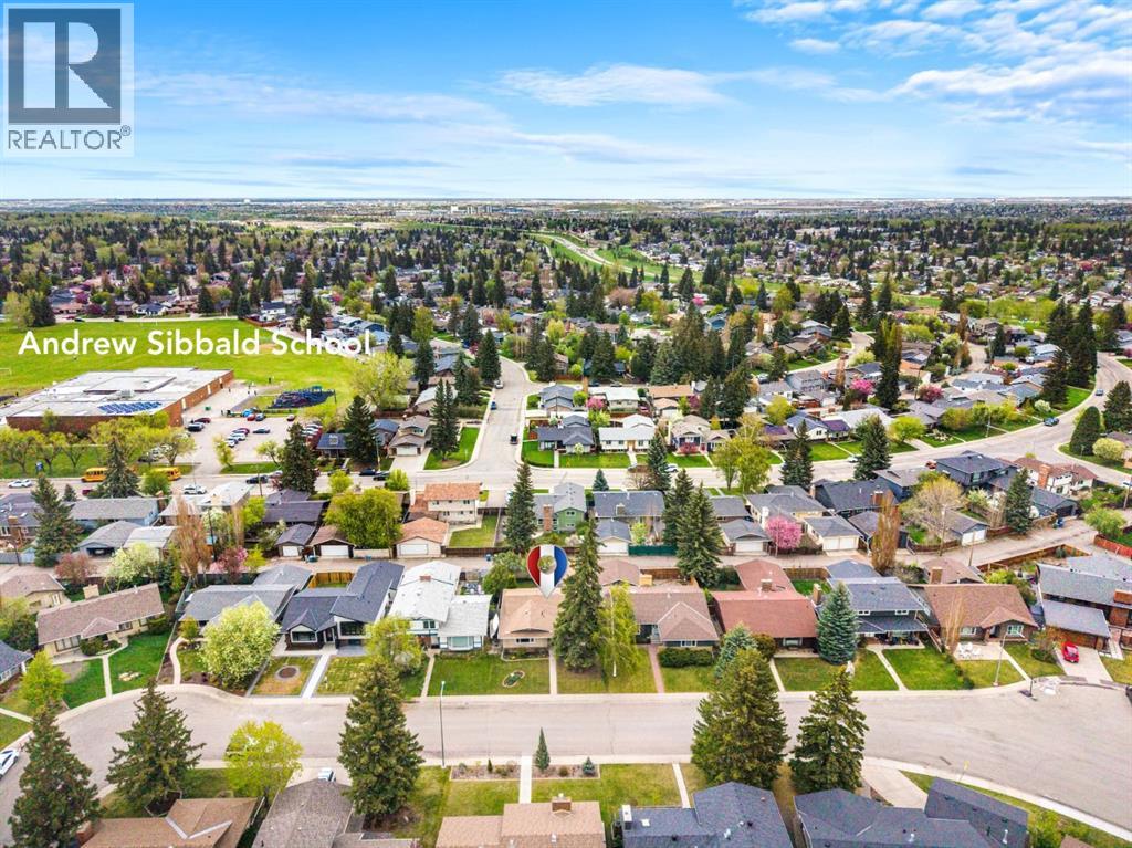 52 Lake Lucerne Close SE, Calgary, Alberta  T2J 3H8 - Photo 4 - A2313035