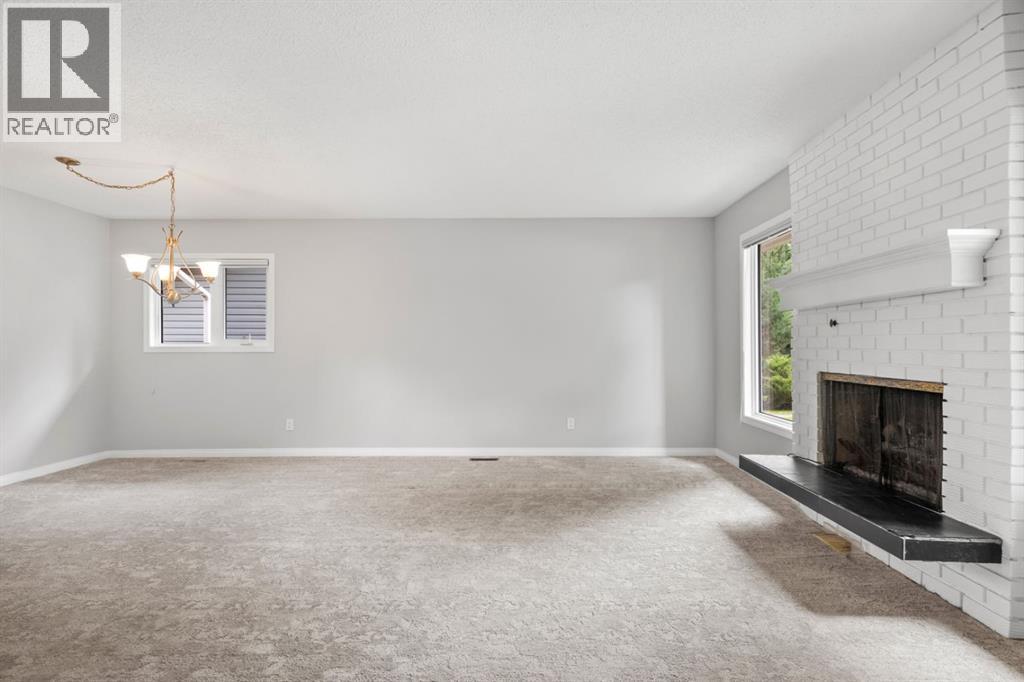 52 Lake Lucerne Close SE, Calgary, Alberta  T2J 3H8 - Photo 12 - A2313035