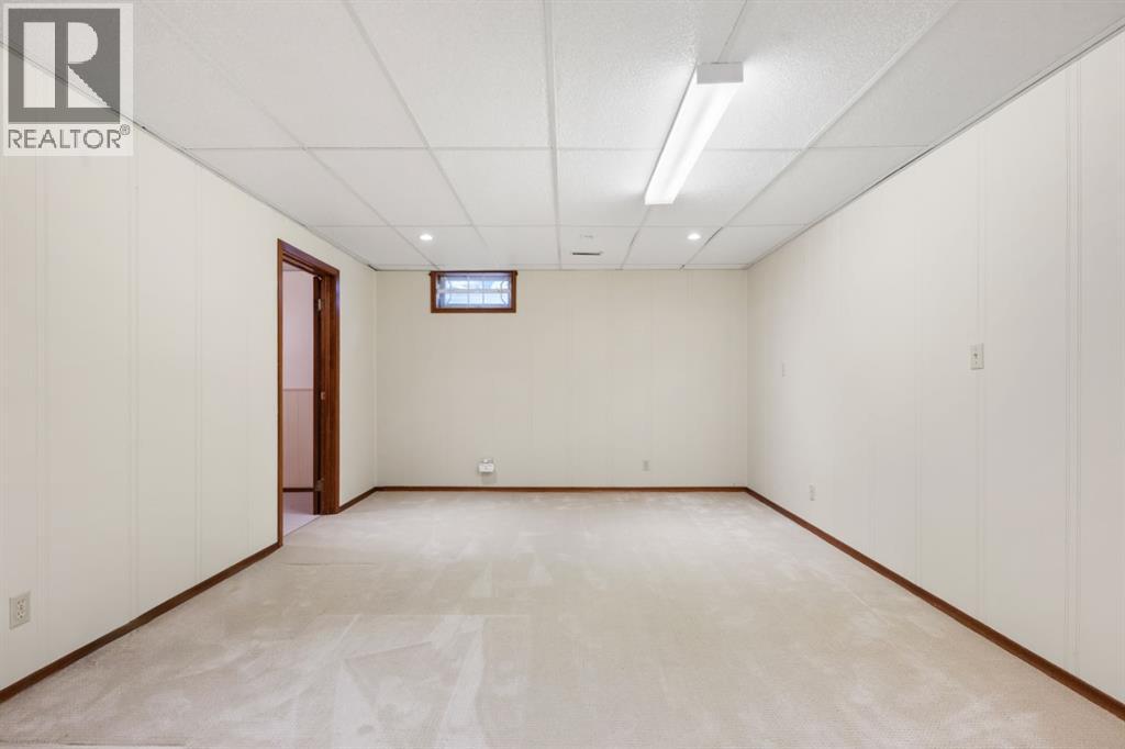 52 Lake Lucerne Close SE, Calgary, Alberta  T2J 3H8 - Photo 35 - A2313035