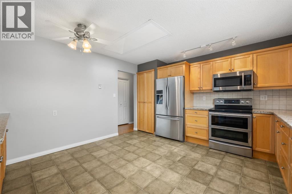 52 Lake Lucerne Close SE, Calgary, Alberta  T2J 3H8 - Photo 16 - A2313035