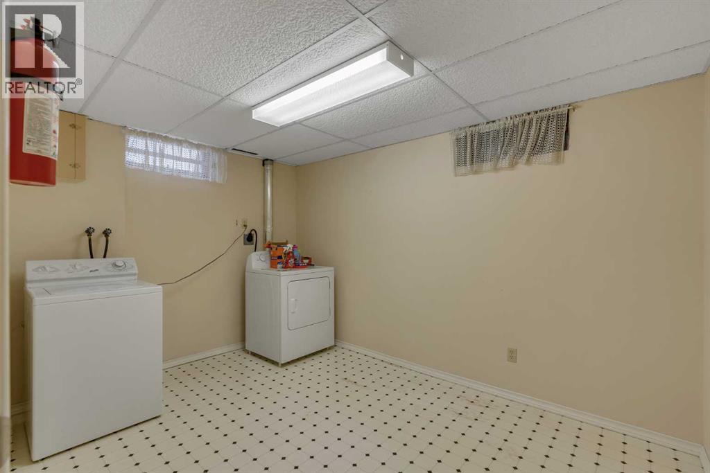 10823 Maplecreek Drive SE, Calgary, Alberta  T2J 1V4 - Photo 26 - A2301461