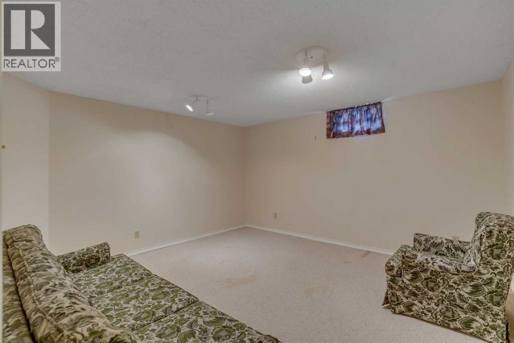 10823 Maplecreek Drive SE, Calgary, Alberta  T2J 1V4 - Photo 24 - A2301461