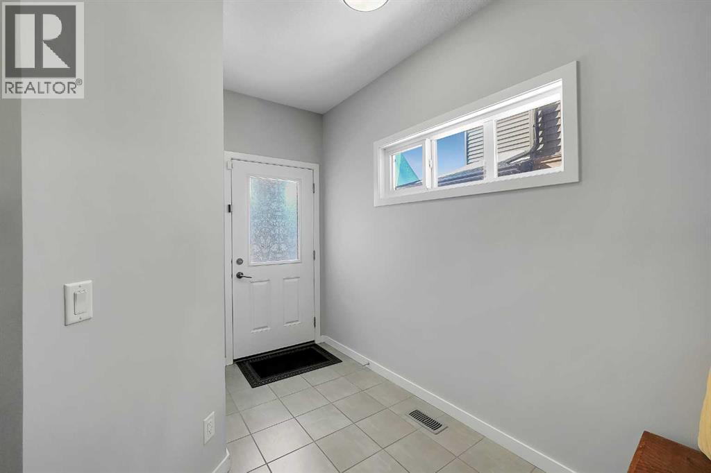216 Carringvue Manor NW, Calgary, Alberta T3P 0W3 - Photo 3 - A2311000