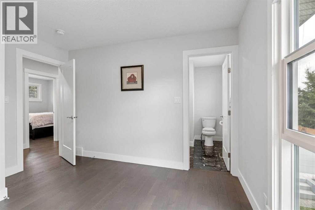 1303 105 Avenue SW, Calgary, Alberta  T2W 0B5 - Photo 25 - A2313272