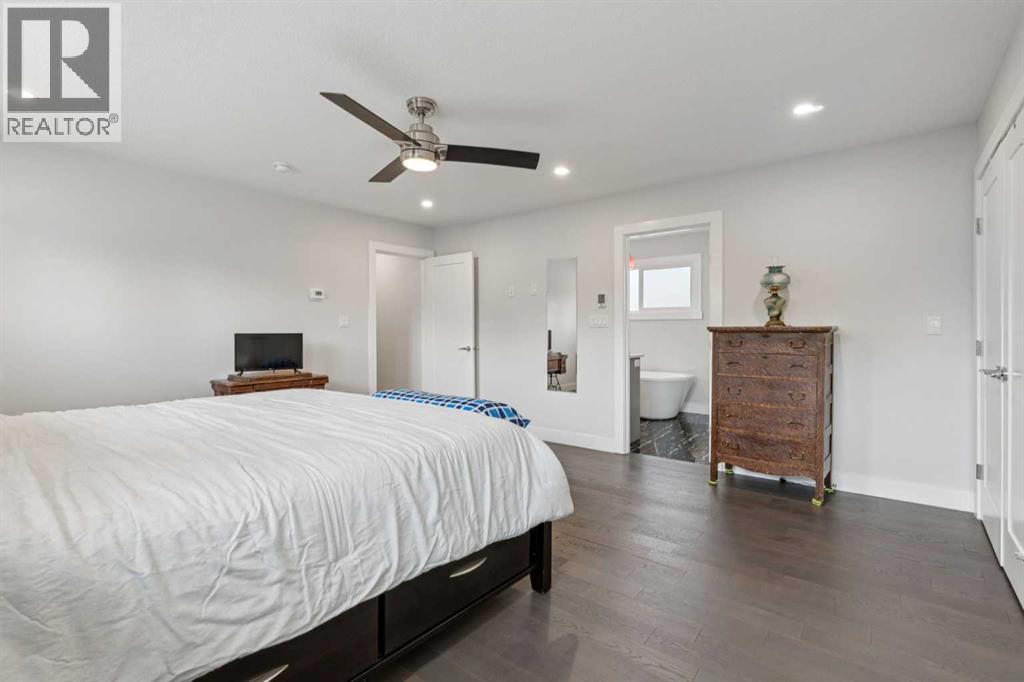 1303 105 Avenue SW, Calgary, Alberta  T2W 0B5 - Photo 19 - A2313272