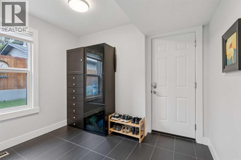 1303 105 Avenue SW, Calgary, Alberta  T2W 0B5 - Photo 33 - A2313272