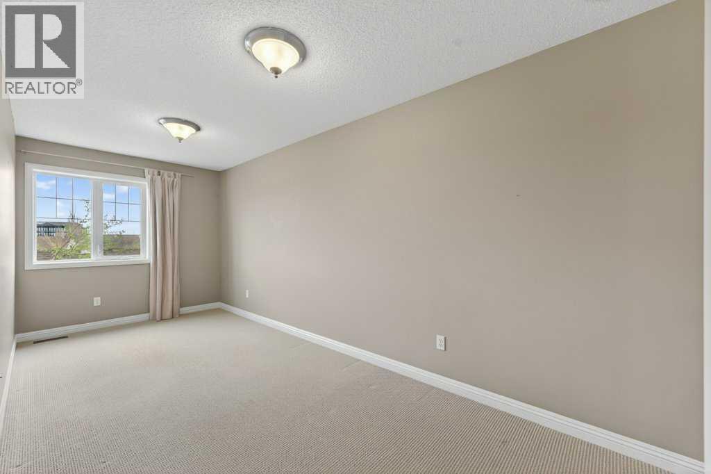 44 Mike Ralph Way SW, Calgary, Alberta  T3E 0H8 - Photo 21 - A2311472